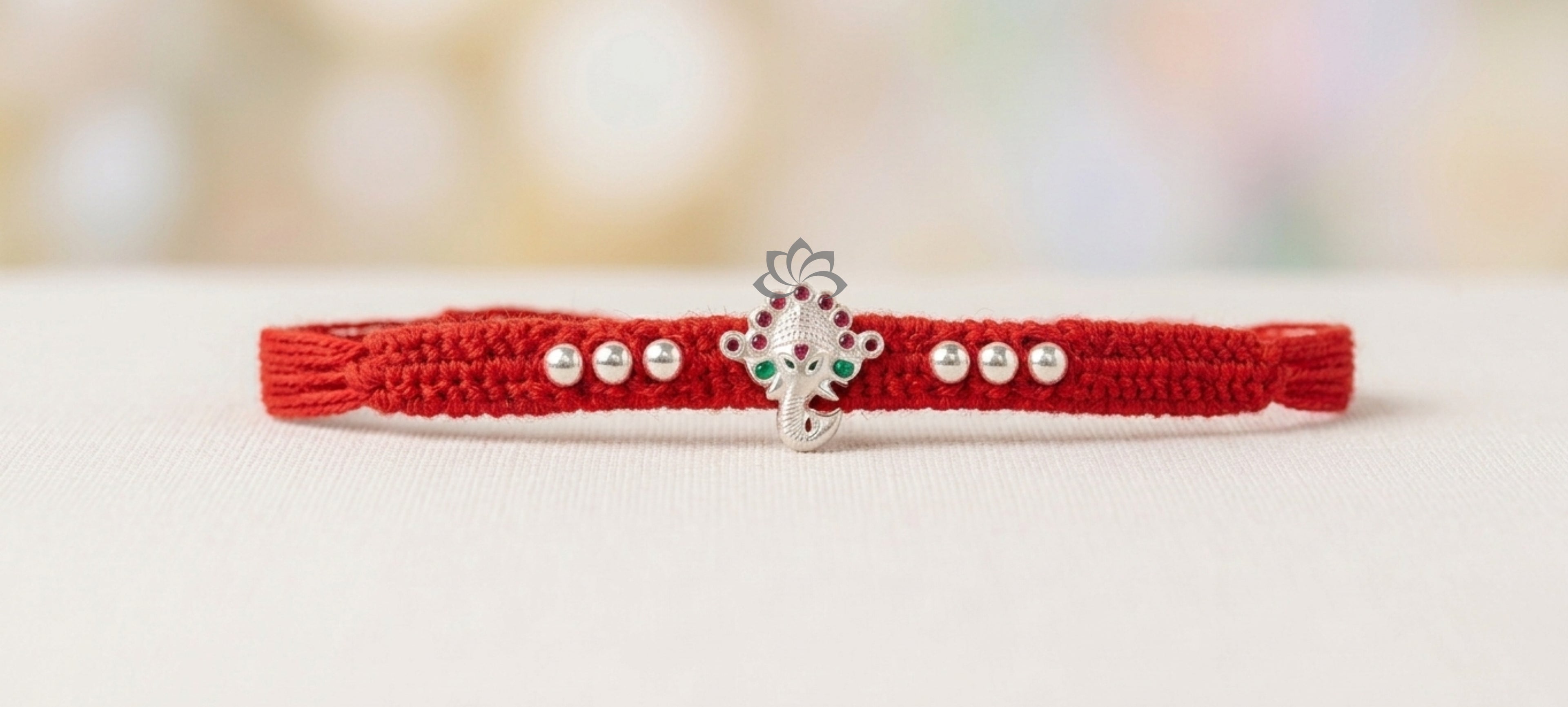 Silver GANESH Rakhi – Elegant Silver Rakhi