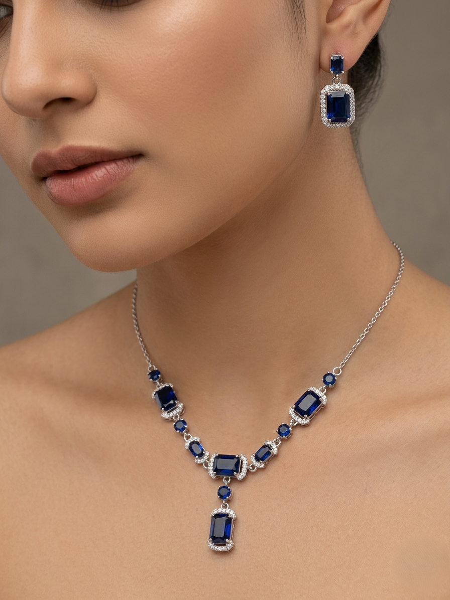 92.5 Sterling Silver Necklace earring set with cut blue stones
