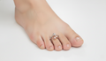 92.5 Sterling Silver Double -Tone Toe Ring with a bow and heart design Singly or in pairs