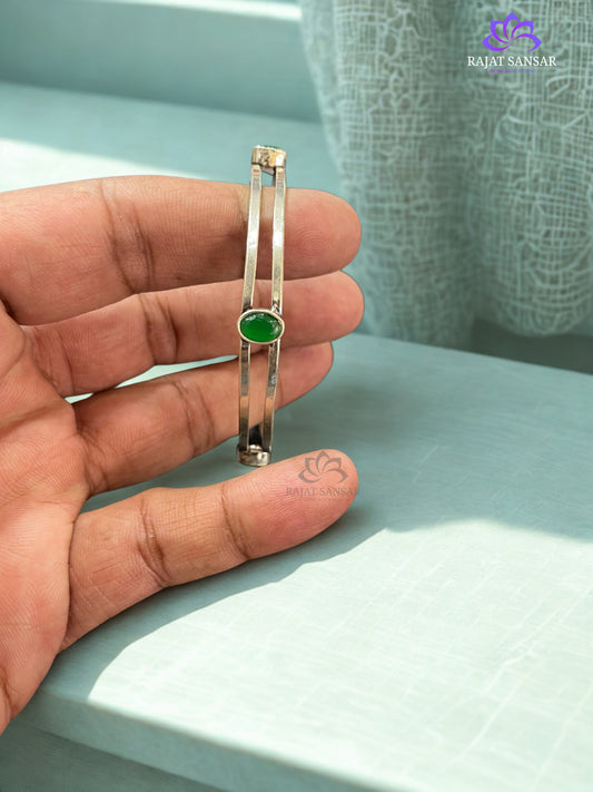 92.5 Sleek Silver Bangle with Oval Green Cut Stone