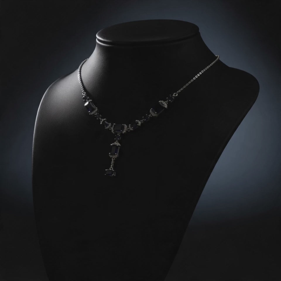 92.5 Sterling Silver Necklace earring set with cut blue stones